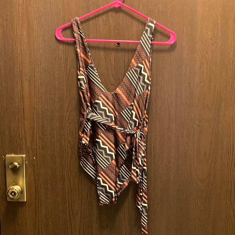 Size 8 swimsuit with tie plunging neckline Pretty little thing brand
